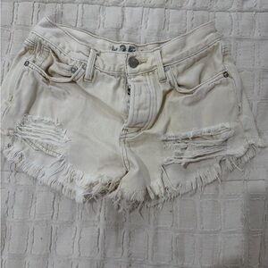 We The Free Cream Distressed Denim Shortalls